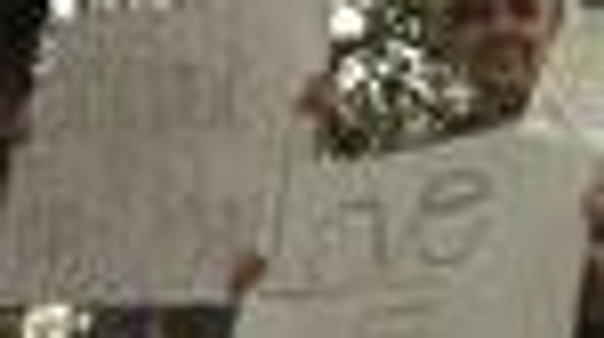 Protesters Rally for Lesbian English Teacher Fired from Arkansas Catholic School