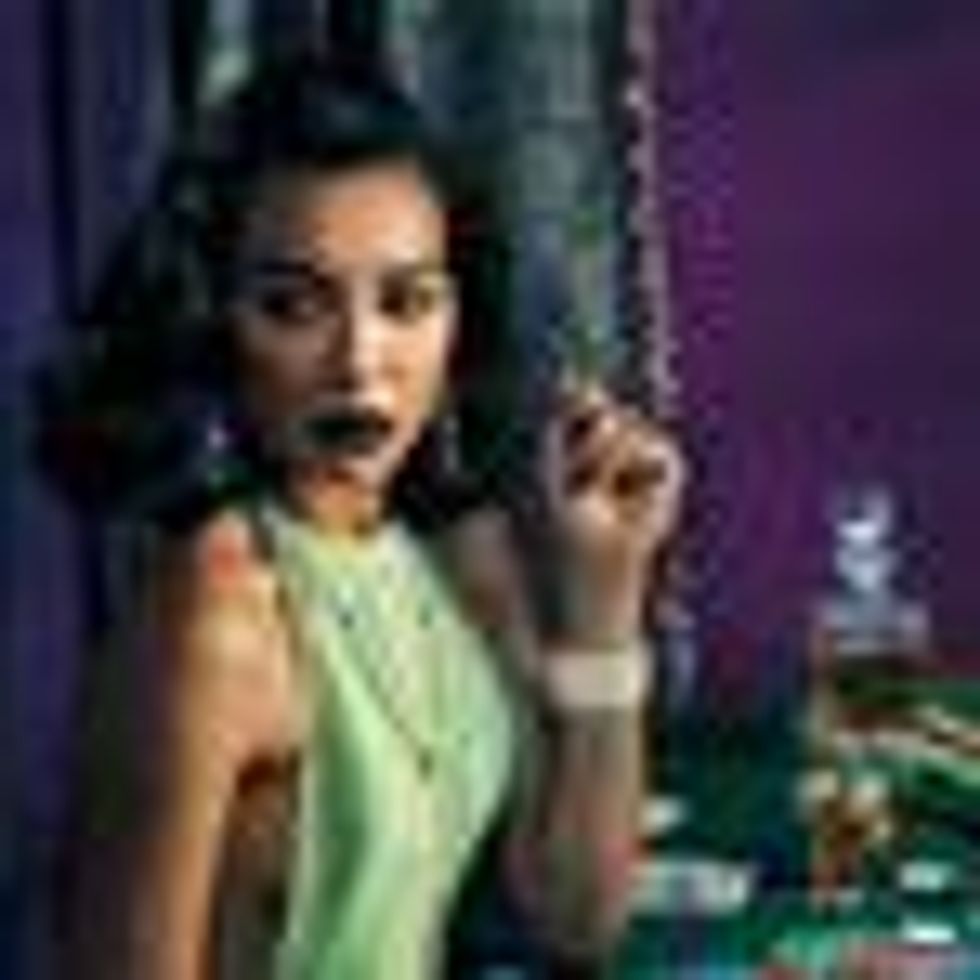 Shot of the Day: Naya Rivera Plays Noir Strip Poker for Complex 