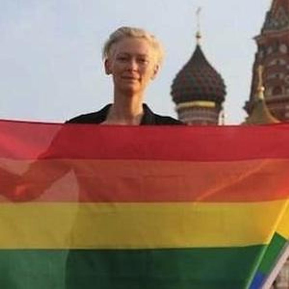 Shot of the Day: Tilda Swinton Wants You to Share this Pic of Her Waving a Rainbow Flag in Russia