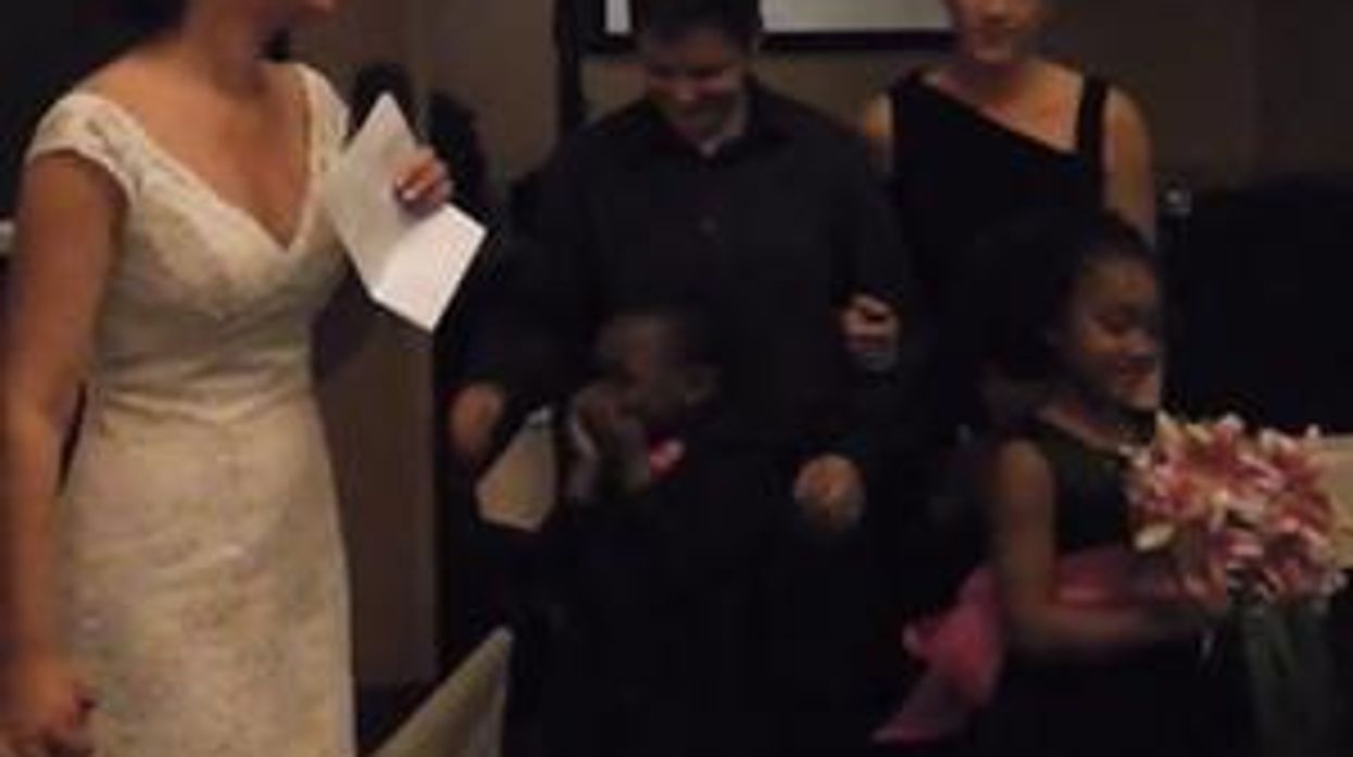 WATCH: Minnesota Bride Passes Bouquet to Her Lesbian Sister, Wife, and Kids