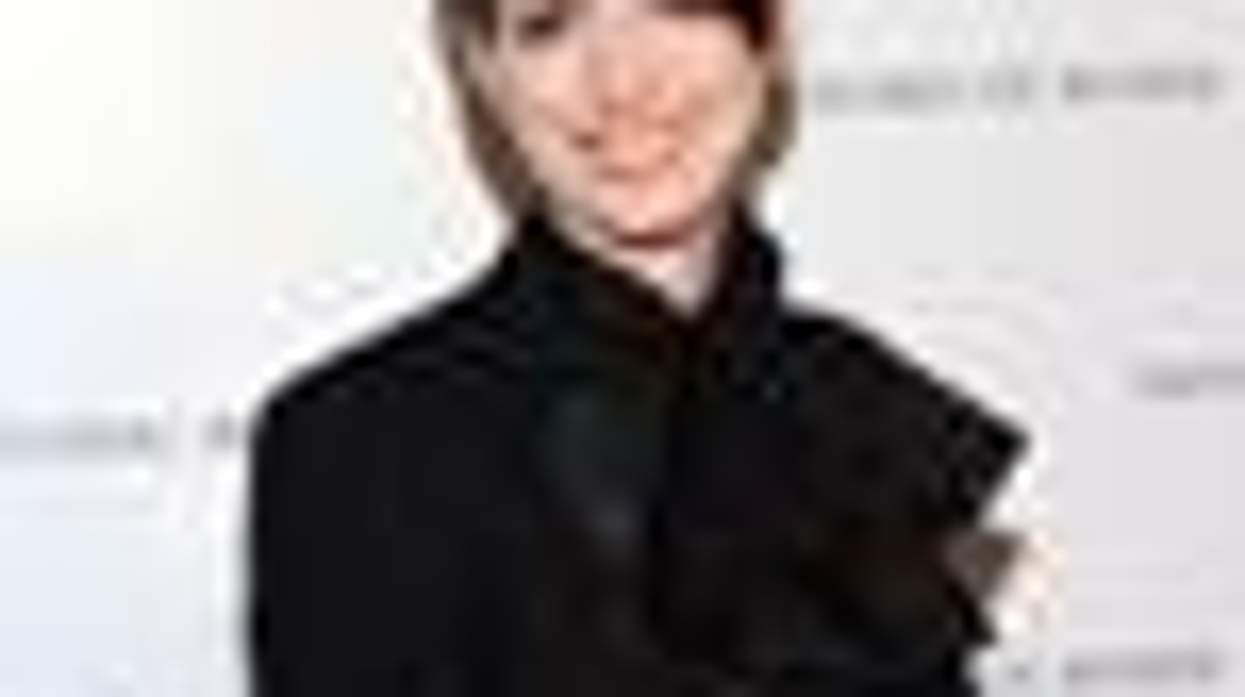 Shot of the Day: Anne Hathaway Sizzles in a Suit and Poet's Sleeves