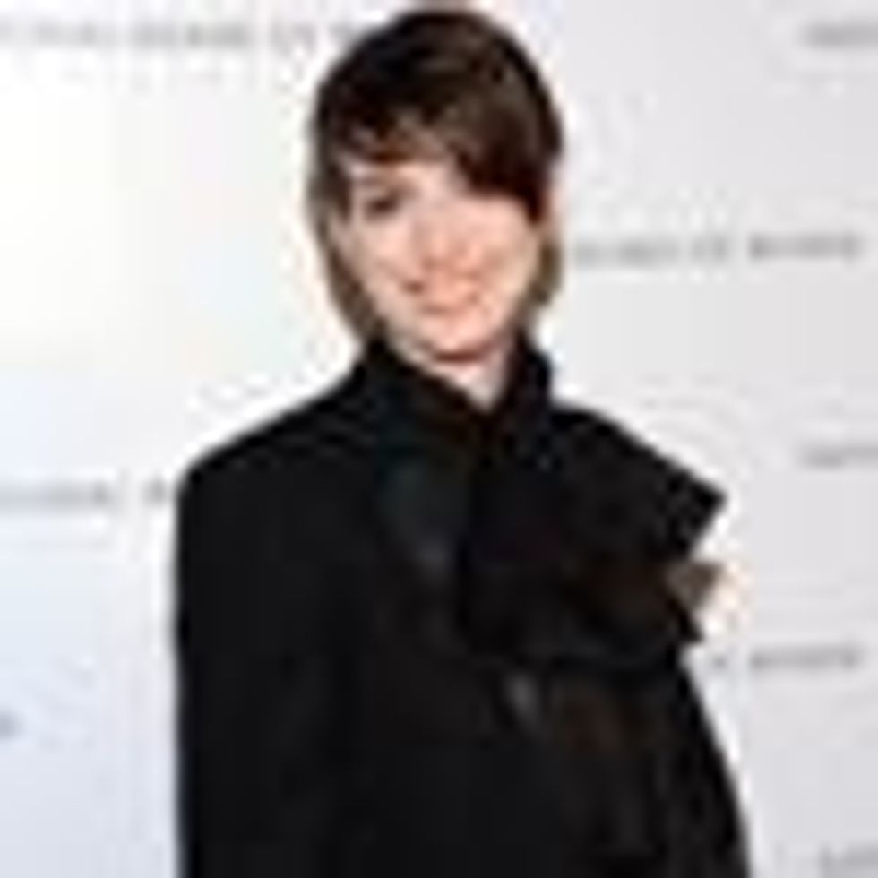 Shot of the Day: Anne Hathaway Sizzles in a Suit and Poet's Sleeves 