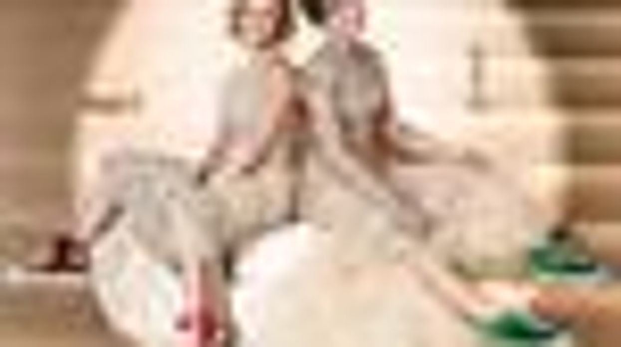 Shot of the Day: Tina Fey and Amy Poehler Rock Chuck Taylors and Lamé Gowns