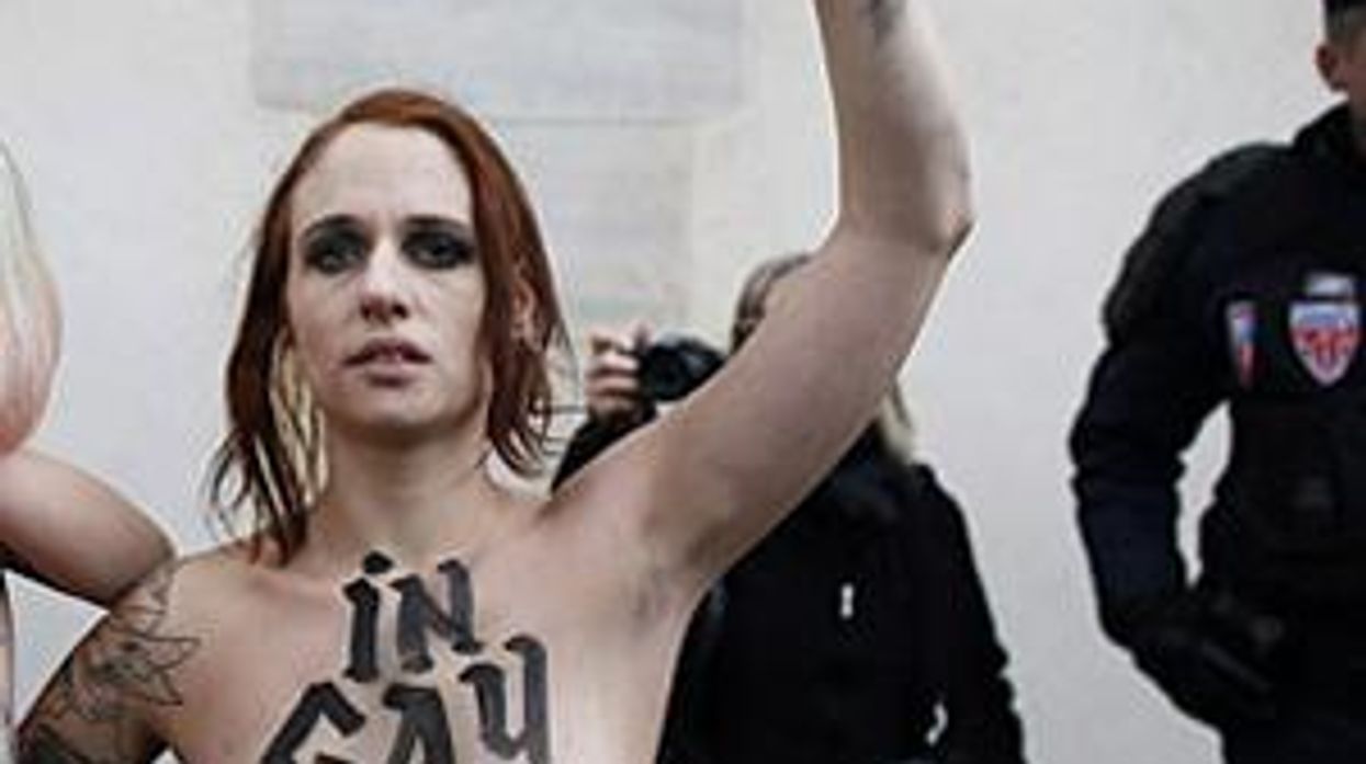 Watch: Topless Feminists Protest Antigay Demonstrations in France