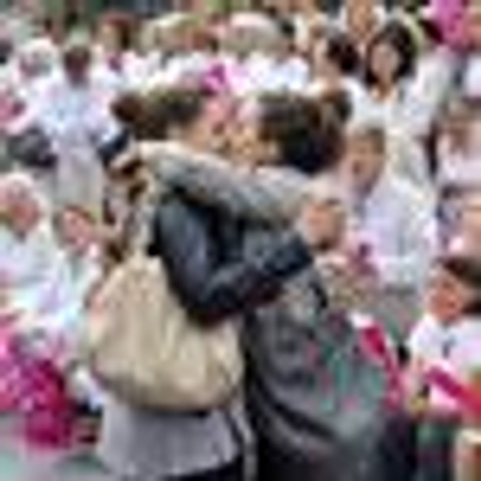 Shot of the Day: All Eyes on Women Kissing at an Antigay Protest in France 