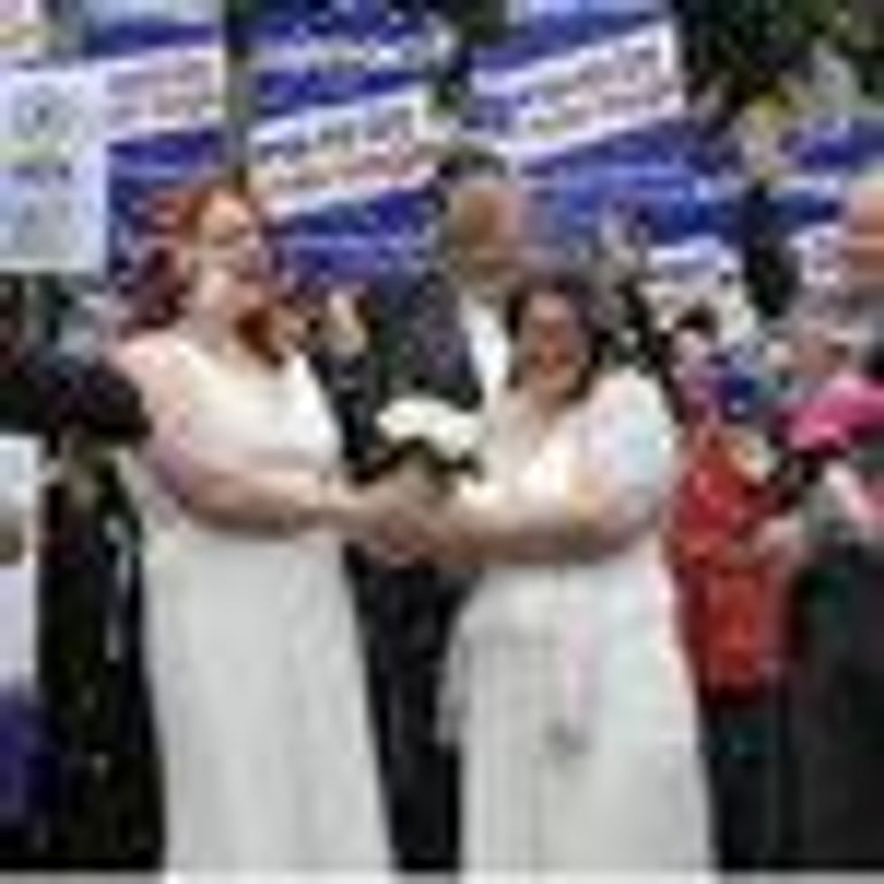 Scottish Lesbian Couple Hold Mock Wedding Outside Parliament in Support of Marriage Equality