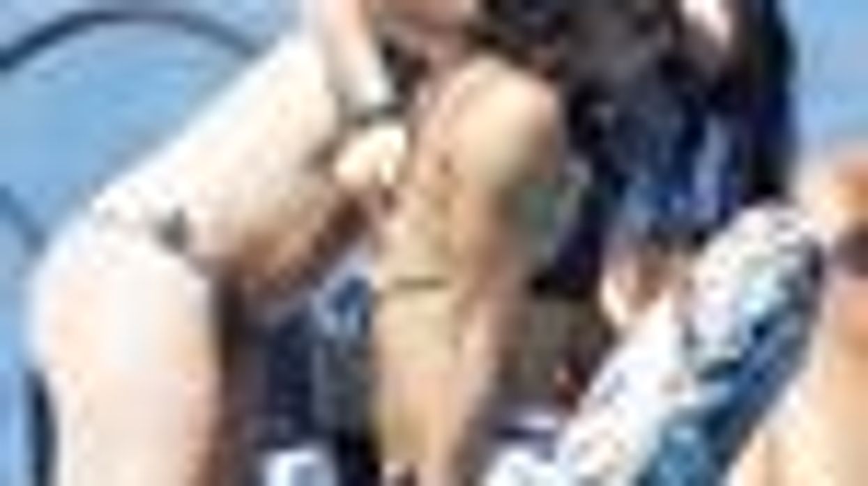 SheWired Shot of The Day: Michelle Rodriguez Frolics with Bikini Babes