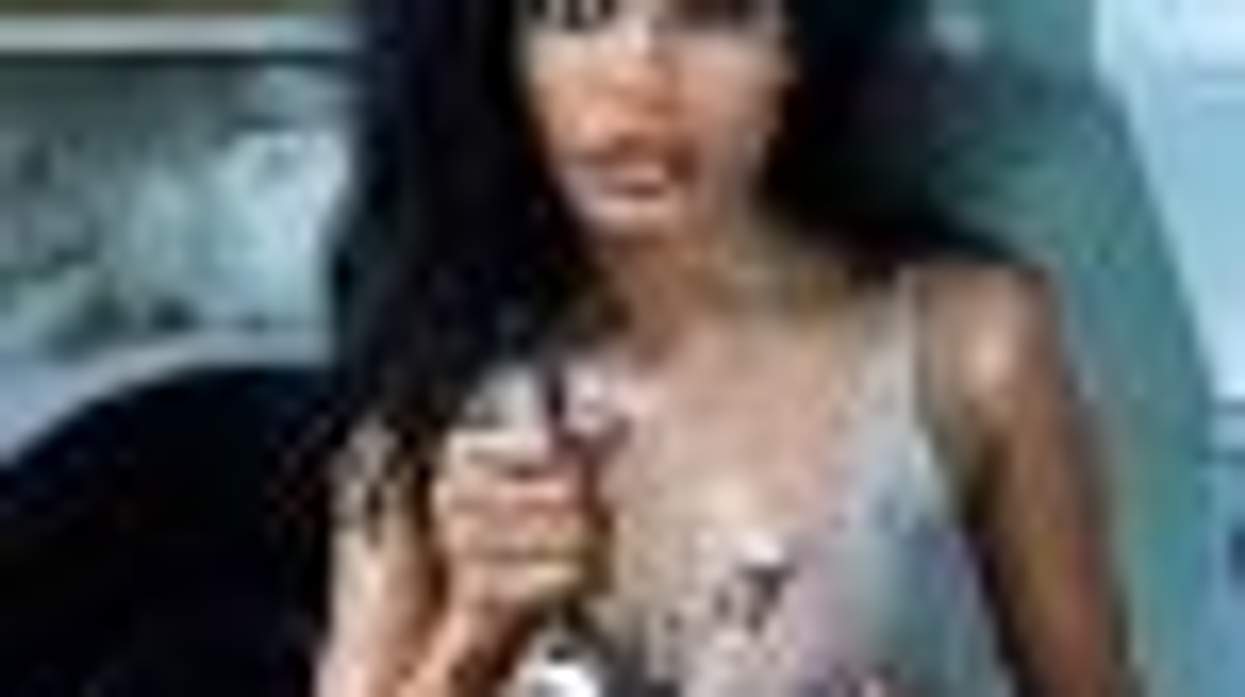 SheWired's Shot of the Day: Freida Pinto and a Pomegranate for 'GQ'