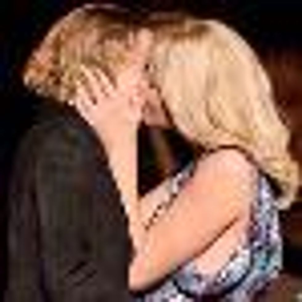 Charlize Theron's $140,000 Lesbian Kiss for Charity!