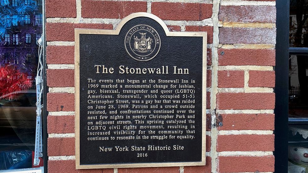 Inscription on wall in memory of the Stonewall riots in Greenwich Village in 1969.