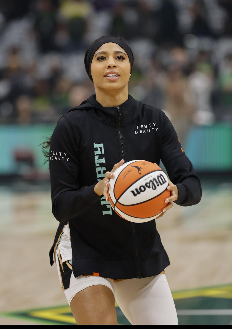 Isabelle Harrison photo gallery queer women 2025 WNBA womens professional basketball league