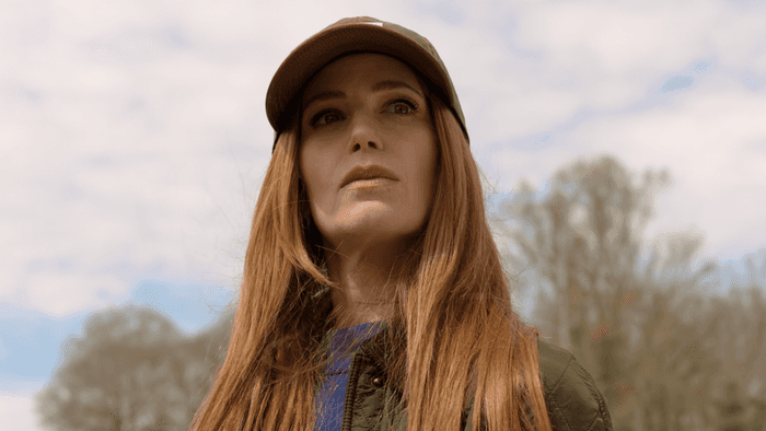 Jaime Ray Newman as Callie on The Hunting Wives