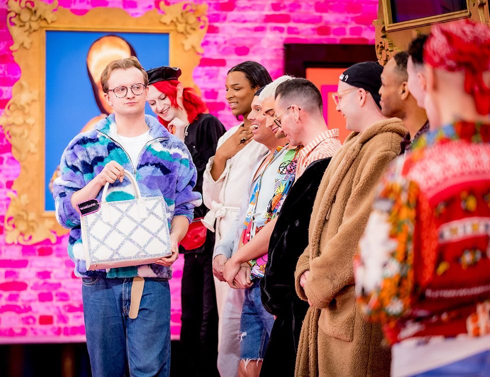 Kate Butch walking with a purse