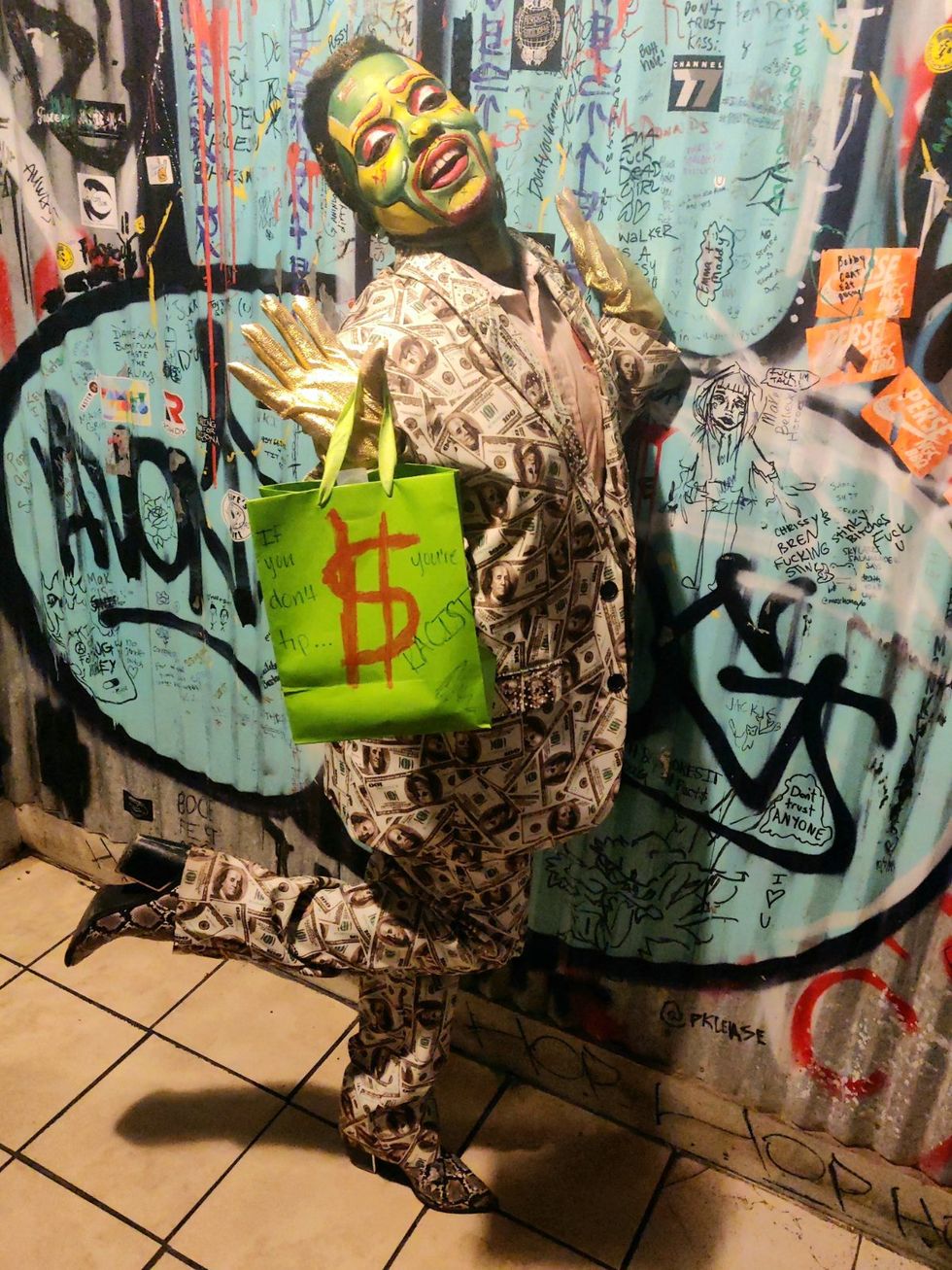 King Perka $exxx in a money suit