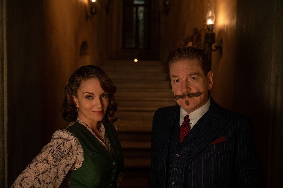 (L-R): Tina Fey as Ariadne Oliver and Kenneth Branagh as Hercule Poirot in 20th Century Studios' A HAUNTING IN VENICE. Photo by Rob Youngson. \u00a9 2023 20th Century Studios. All Rights Reserved.
