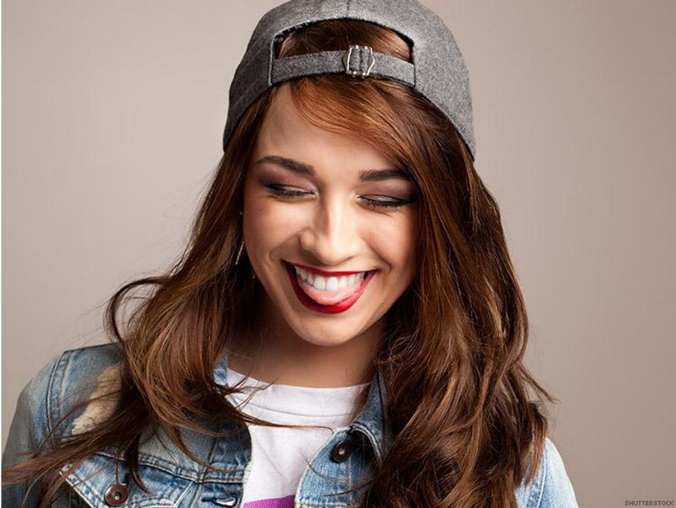 lesbian in a snap-back cap