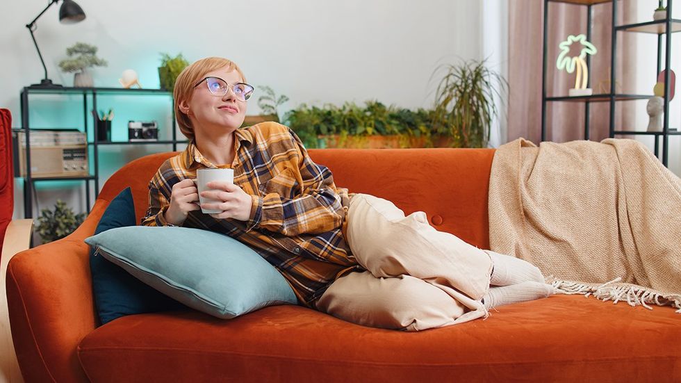 lesbian relaxing with coffee