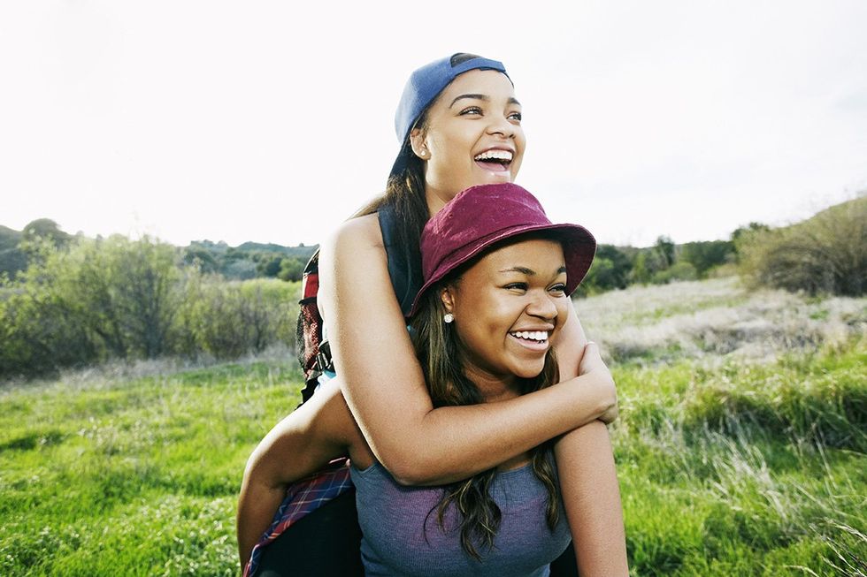 Libra season based on your zodiac sign: lesbian couple in nature