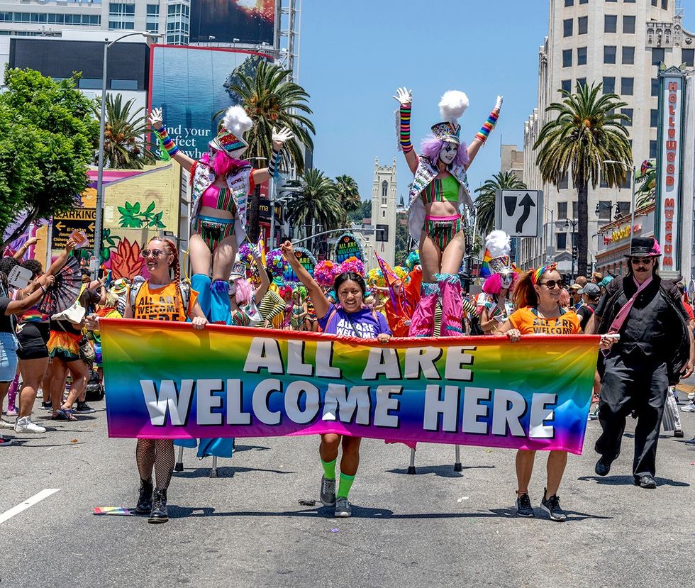 Los Angeles rainbow Parade sign all are welcome photo gallery list LGBTQ pride celebrations festivals parades USA 2024