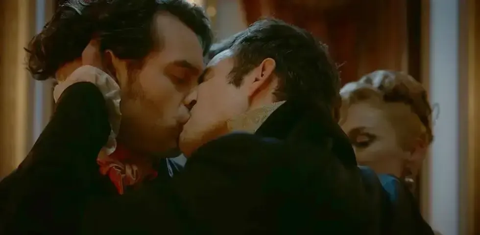 Luke Thompson and Lucas Aurelio kiss in Bridgerton season 3