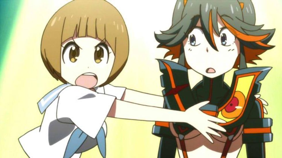 Mako covering Ryouko's chests from view