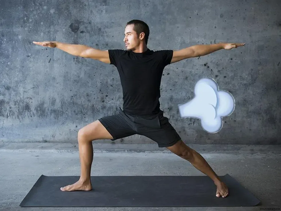 man doing a warrior 2