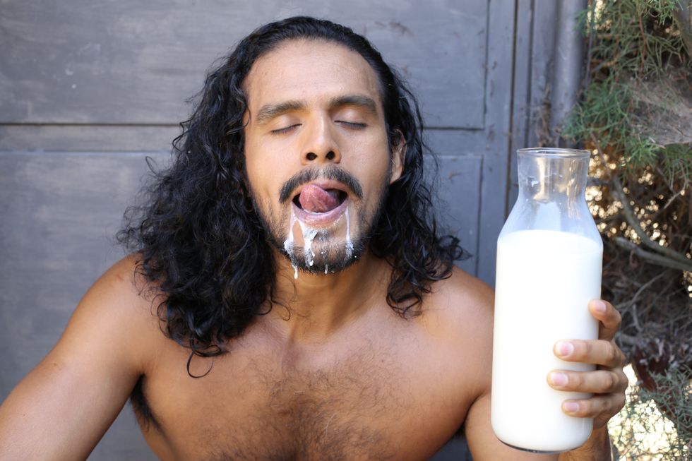 man drinking milk