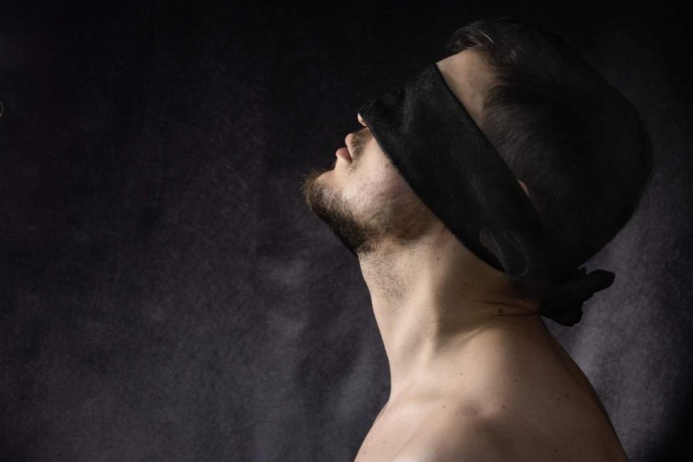 man in a blindfold