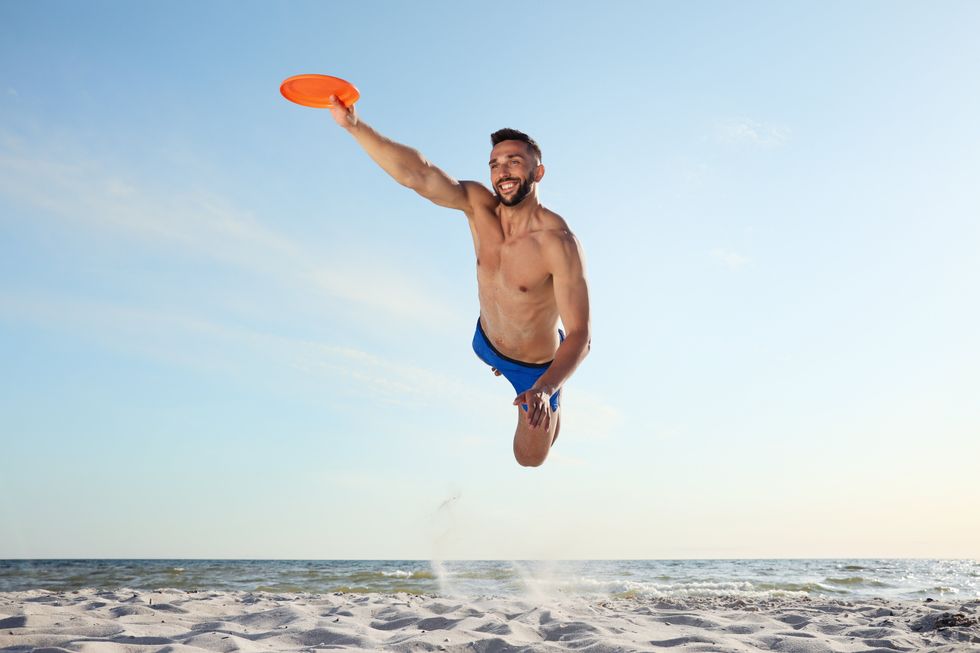 man in the air with a frisbee