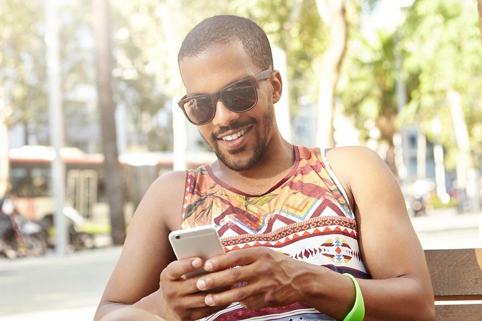 man looking at phone