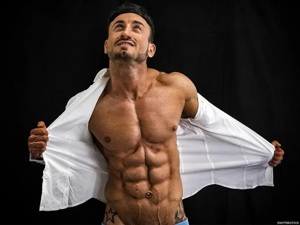 man taking off his shirt