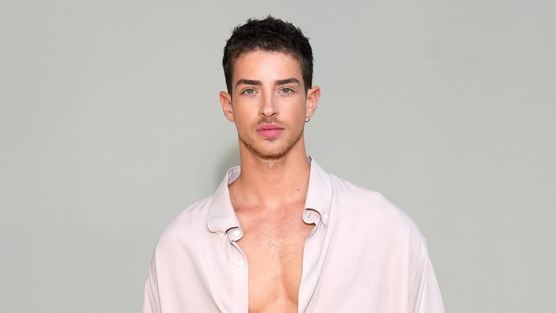 Manu Ríos attends the Ami Alexandre Mattiussi Menswear Spring/Summer 2024 show as part of Paris Fashion Week.