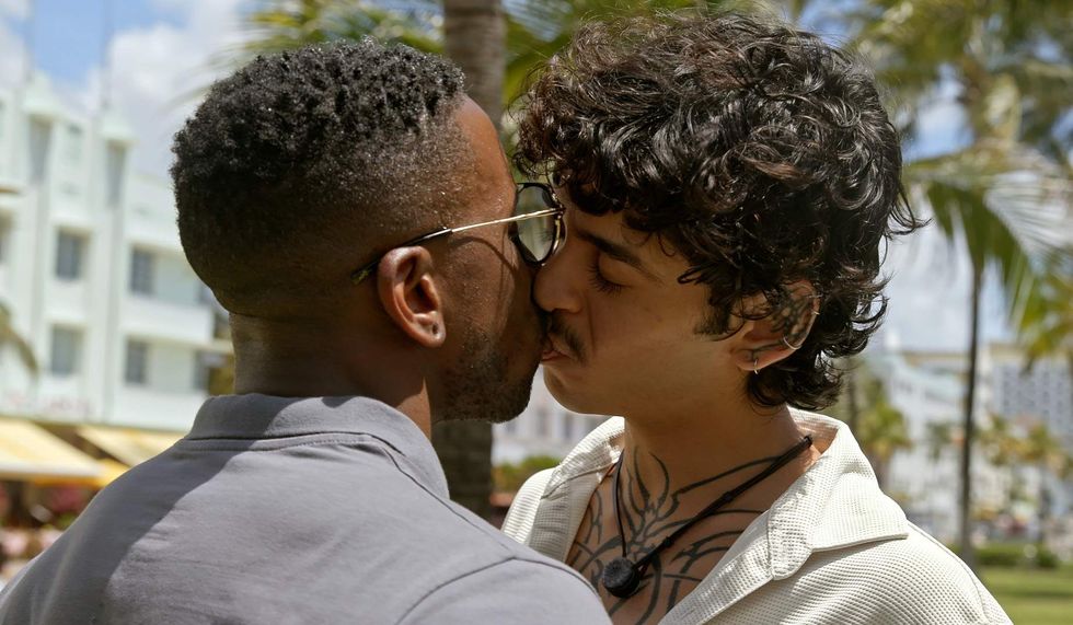 Max Konner kissing a man in 'Ultimate Boys Trip.'