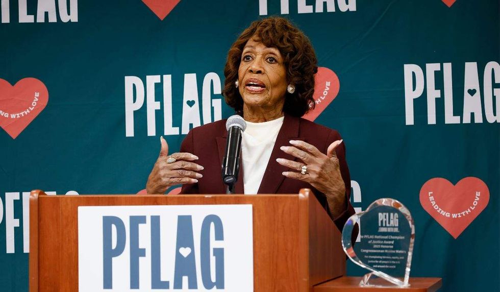 maxine waters speaks to supporters at a pflag event