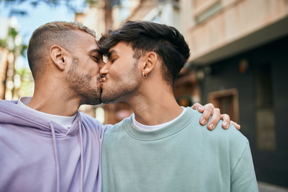 men kissing together