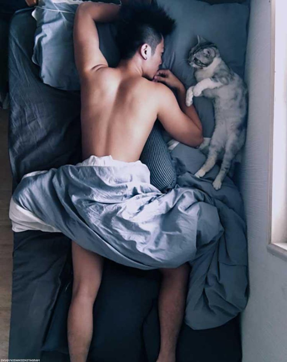 men with cats