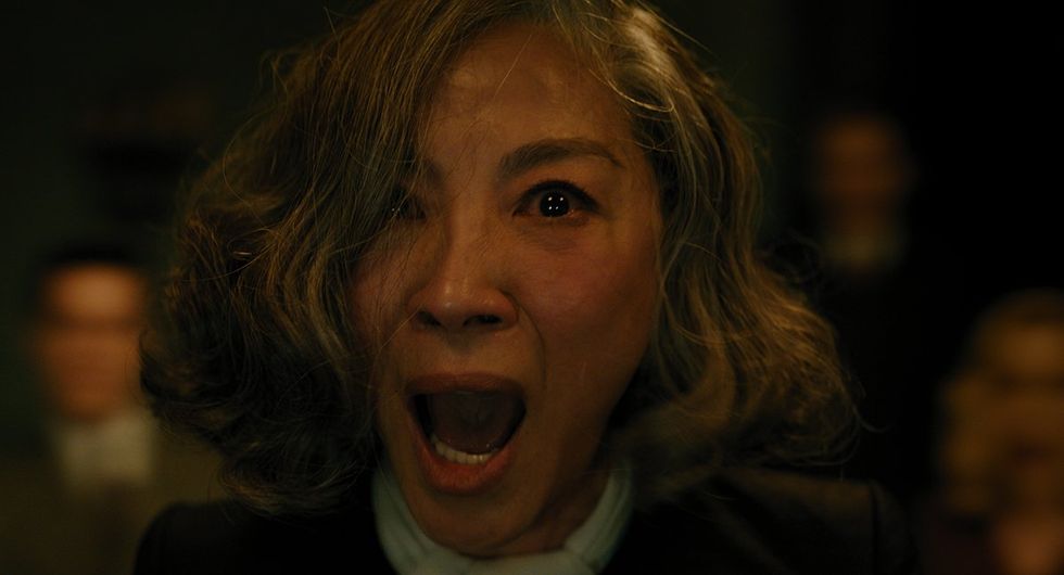 Michelle Yeoh as Mrs. Reynolds in 20th Century Studios' A HAUNTING IN VENICE. Photo courtesy of 20th Century Studios. \u00a9 2023 20th Century Studios. All Rights Reserved.