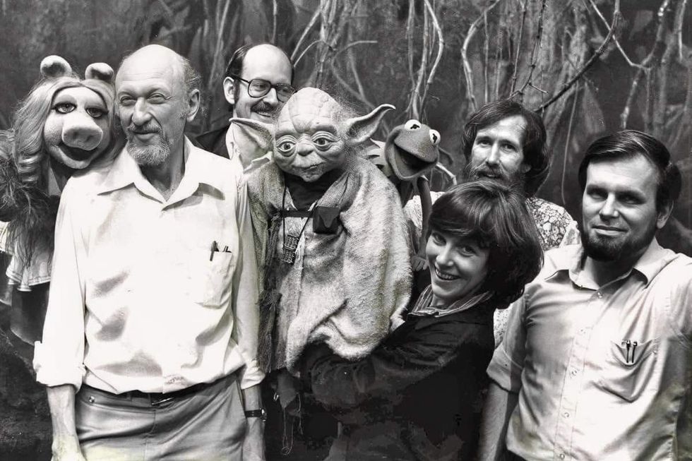 Miss Piggy and Kermit the Frog visit the set of Star Wars The Empire Strikes Back and pose alongside Yoda