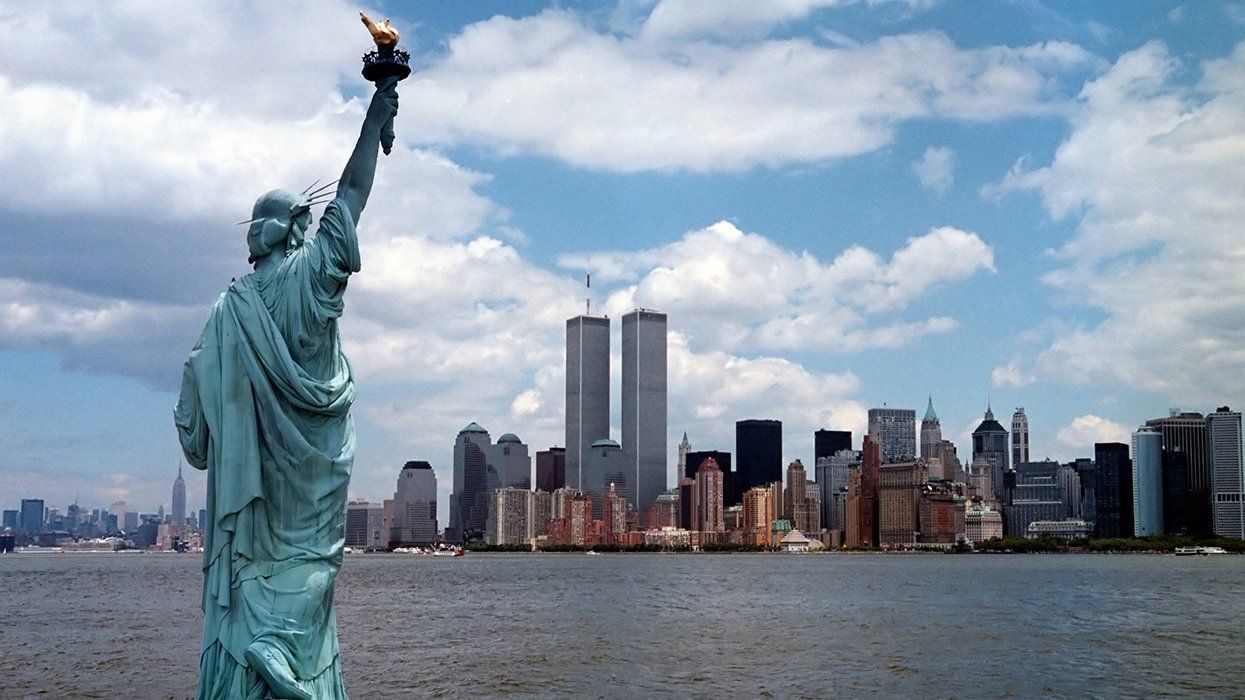 New York Harbor pre 9/11/2001 .Scanned from original 35mm negative showing statue of liberty in foreground and twin towers and lower Manhattan in background