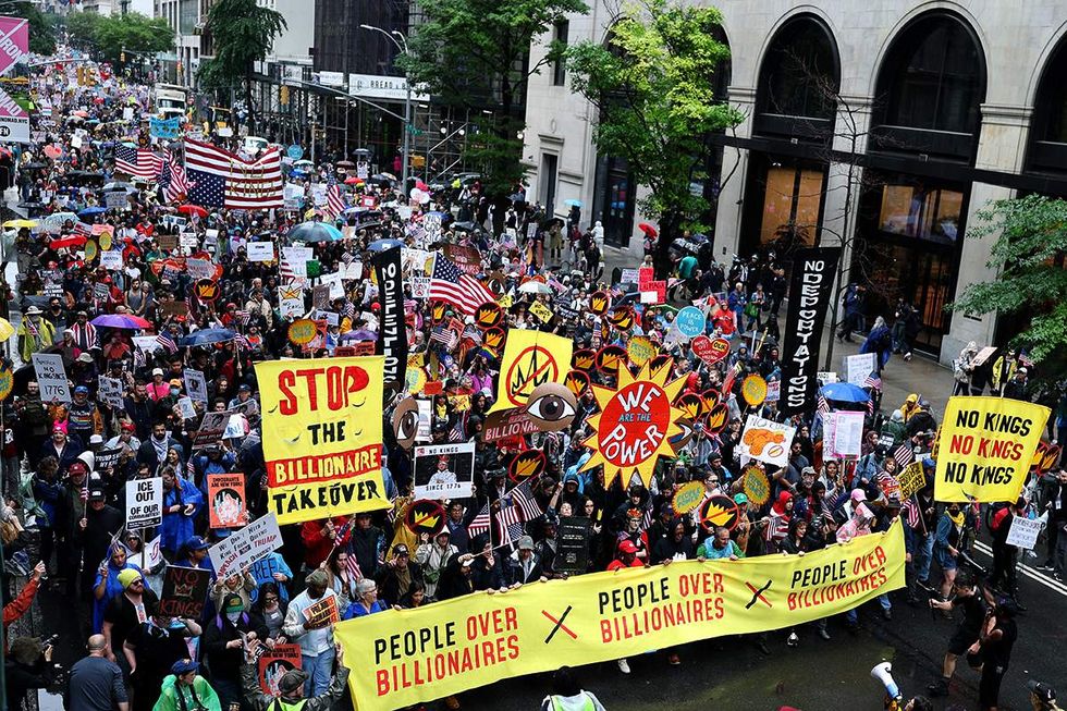No Kings march protest rally NYC June 2025 yellow signs stop the billionaire takeover