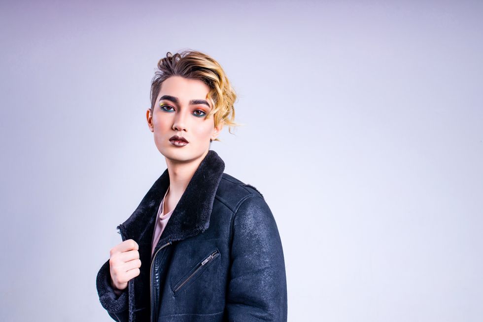 nonbinary person posing