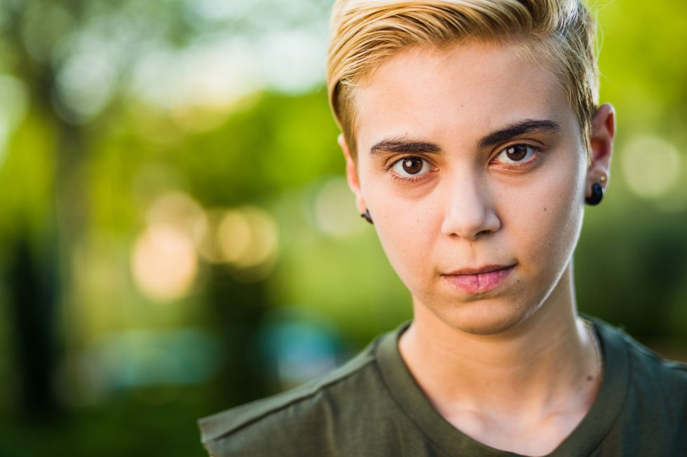 nonbinary person posing