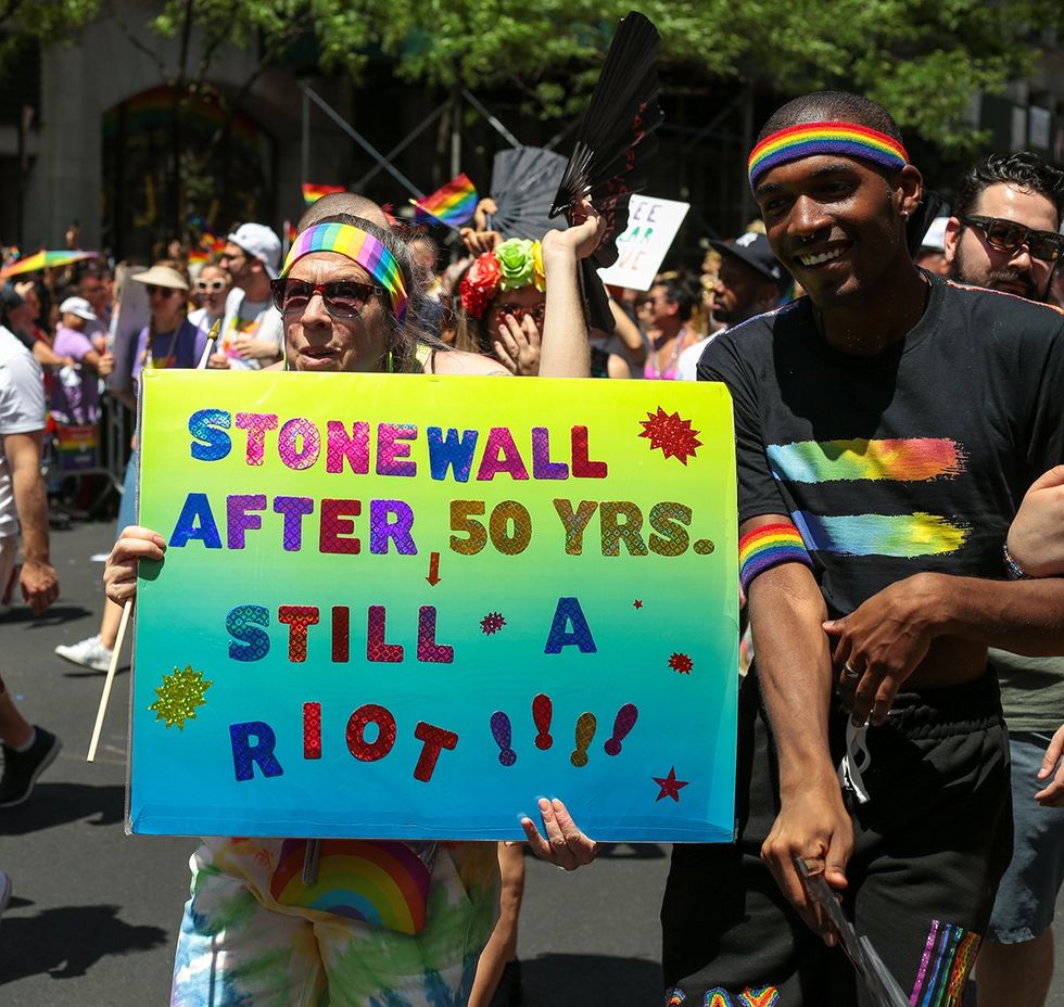 NYC stonewall pride riot sign photo gallery list LGBTQ pride celebrations festivals parades USA 2024
