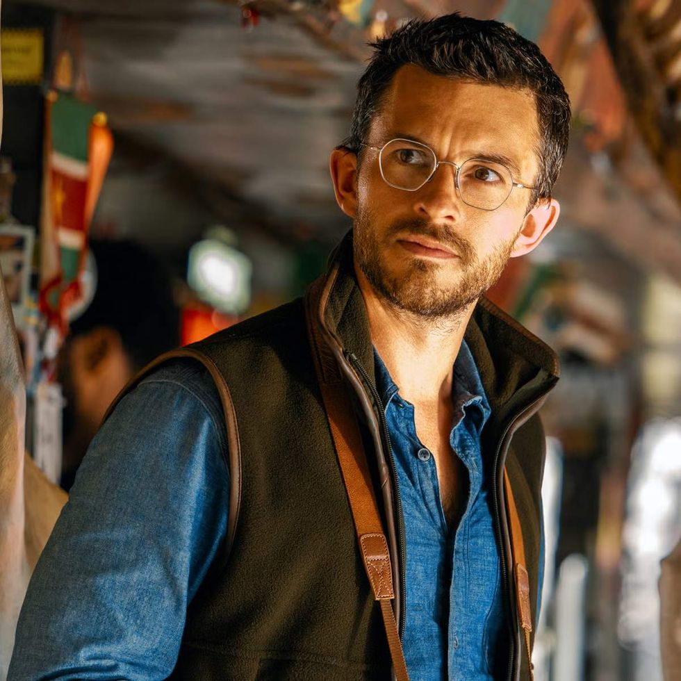 photo gallery of Gay Halloween costumes for 2025 including slutty glasses on jonathan bailey jurassic world rebirth