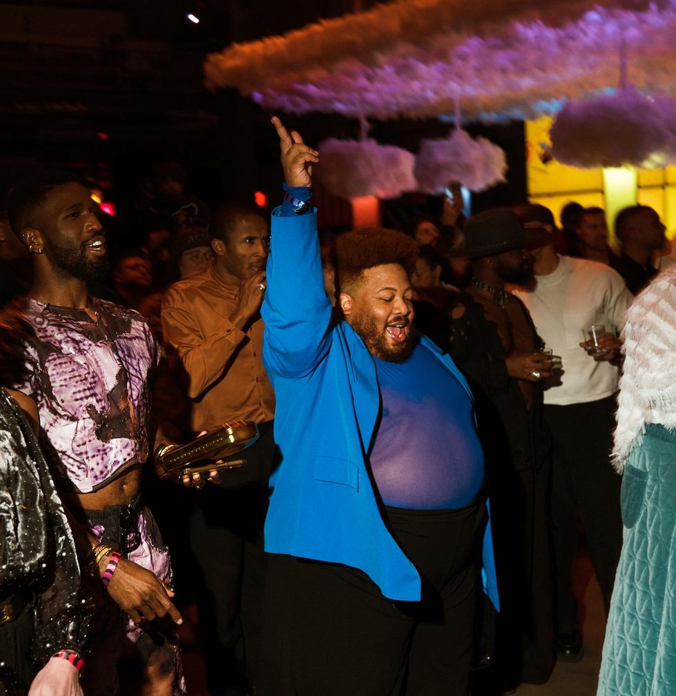 photo gallery queer photographer Roland Fitz Out100 2024 party pics Dexter Mayfield dancing