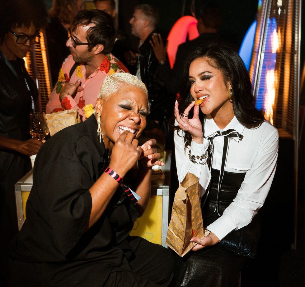 photo gallery queer photographer Roland Fitz Out100 2024 party pics guest and Carissa Rae Martin