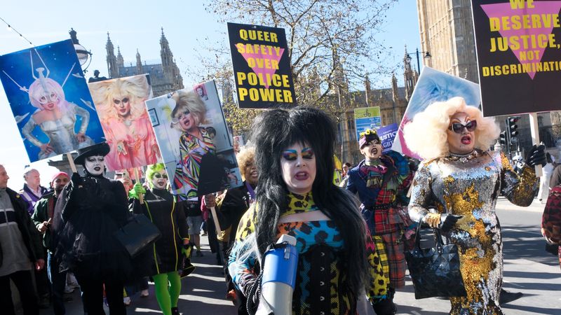 Protesters holding signs and marching at a Justice for Heklina protest in London
