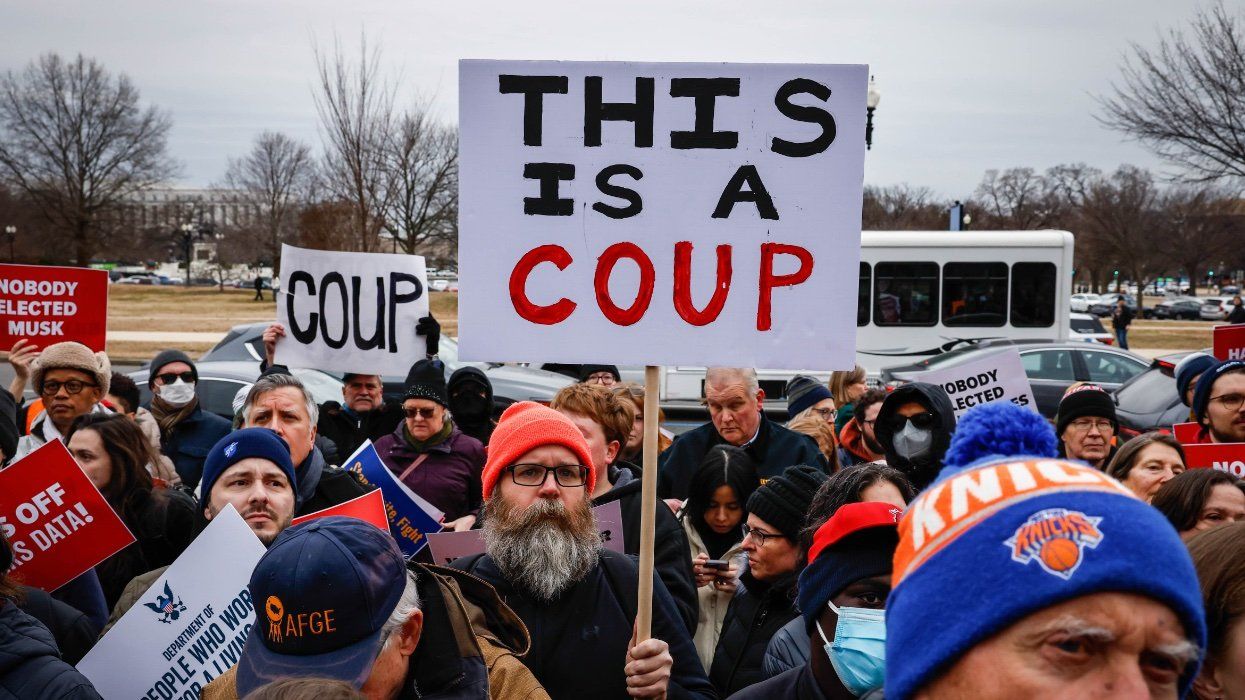 Protesters rally against the Department of Government Efficiency (DOGE) outside the U.S. Department of Labor (DOL) on February 05, 2025 in Washington, DC.