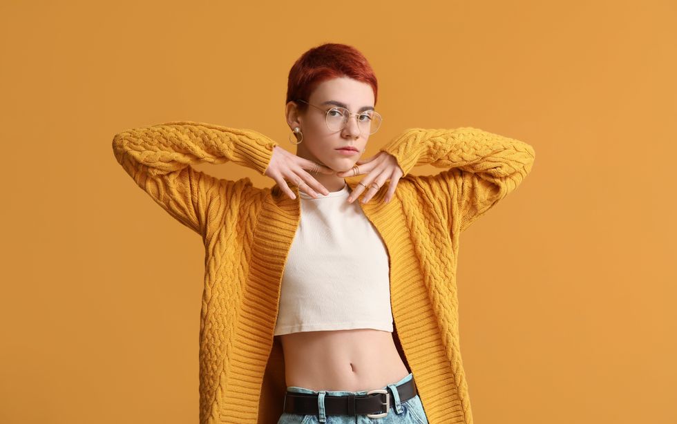 queer non binary person posing