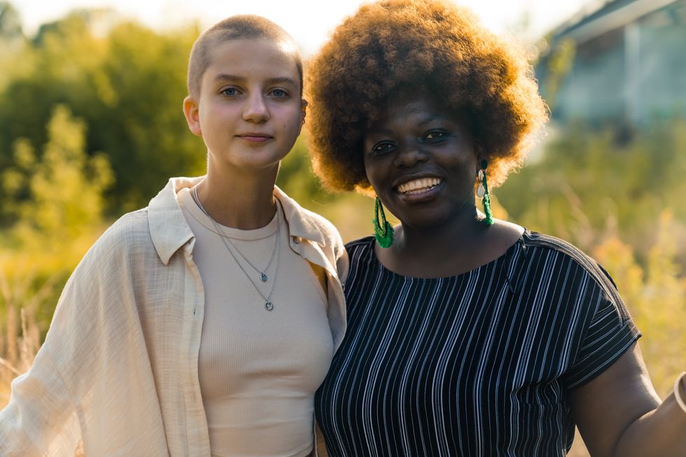 queer women posing together